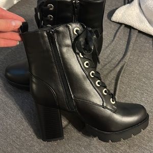 Black. Never worn. Sincerely Jules. Size 8.